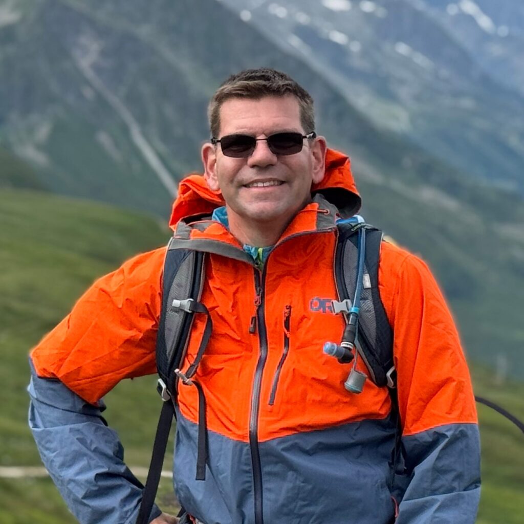 Image of Kevin Hytten with mountains in the background.
